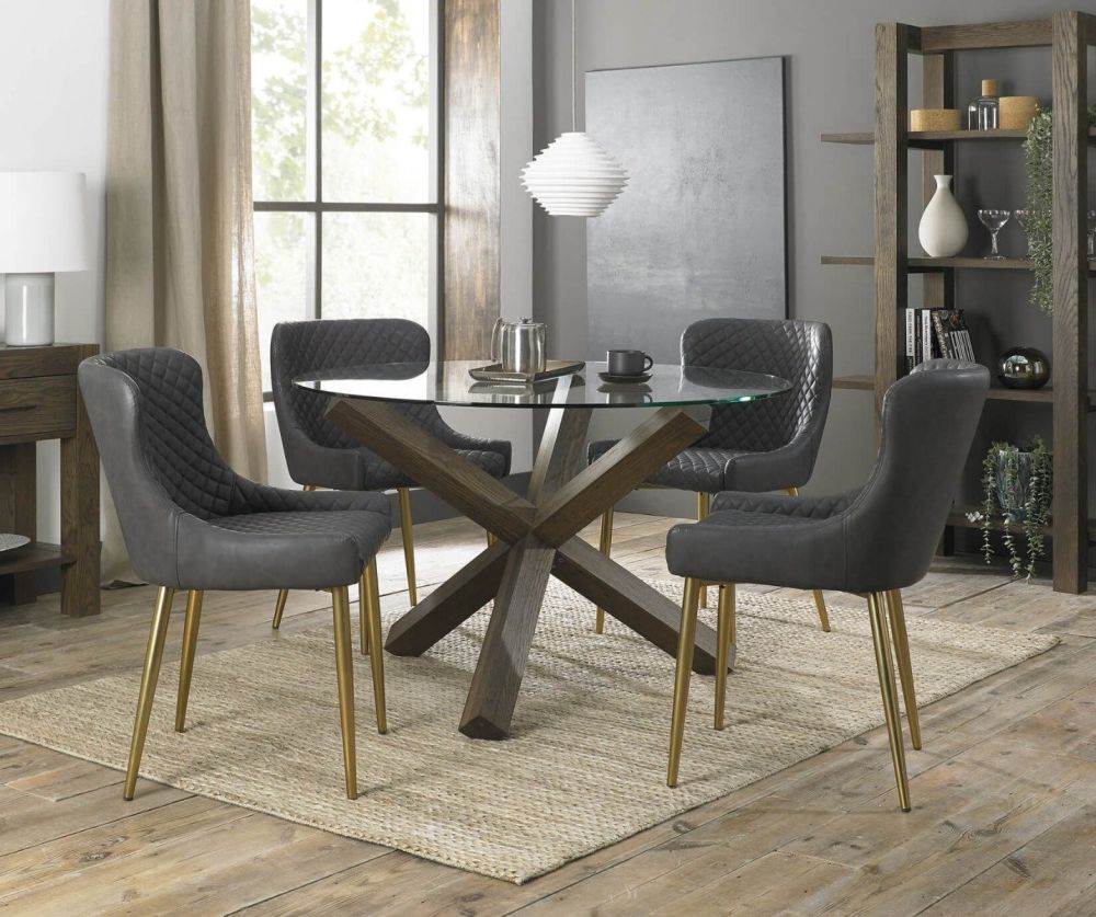 Bentley Designs Turin Dark Oak Circular Glass Dining Table and 4 Cezanne Dark Grey Faux Leather Chairs with Matt Gold Legs