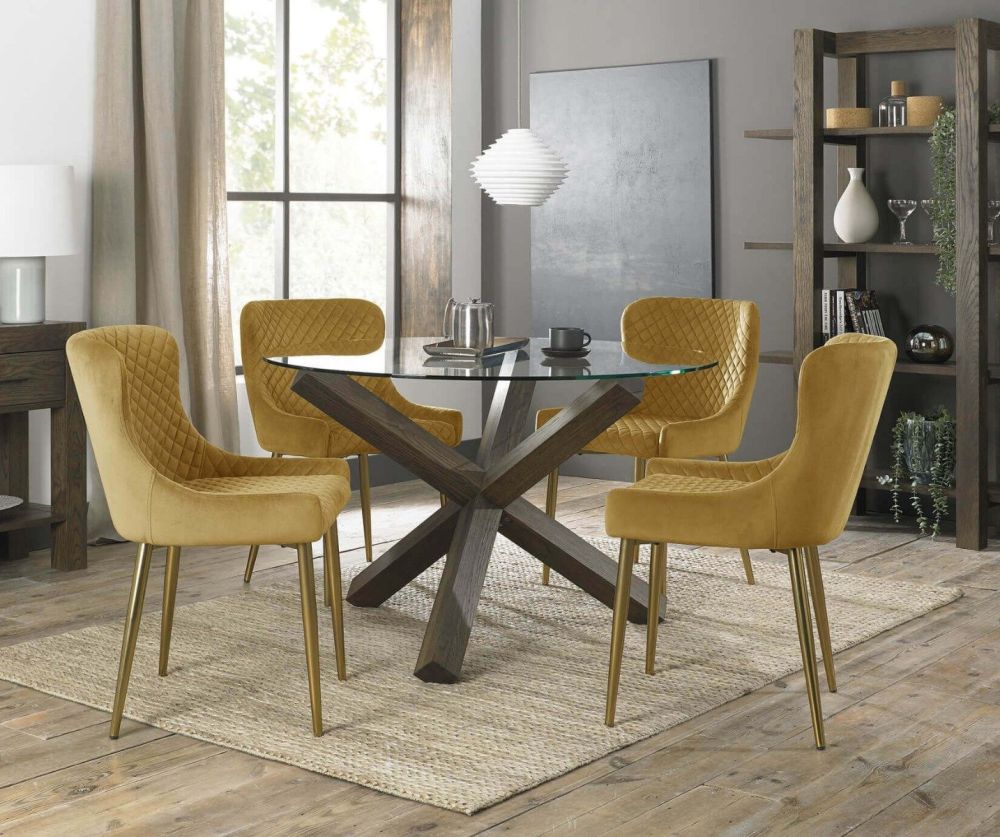 Bentley Designs Turin Dark Oak Circular Glass Dining Table and 4 Cezanne Mustard Velvet Fabric Chairs with Matt Gold Legs