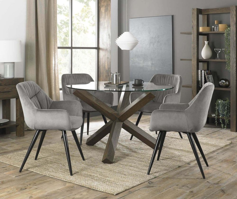 Bentley Designs Turin Dark Oak Circular Glass Dining Table and 4 Dali Grey Velvet Fabric Chairs with Sand Black Legs