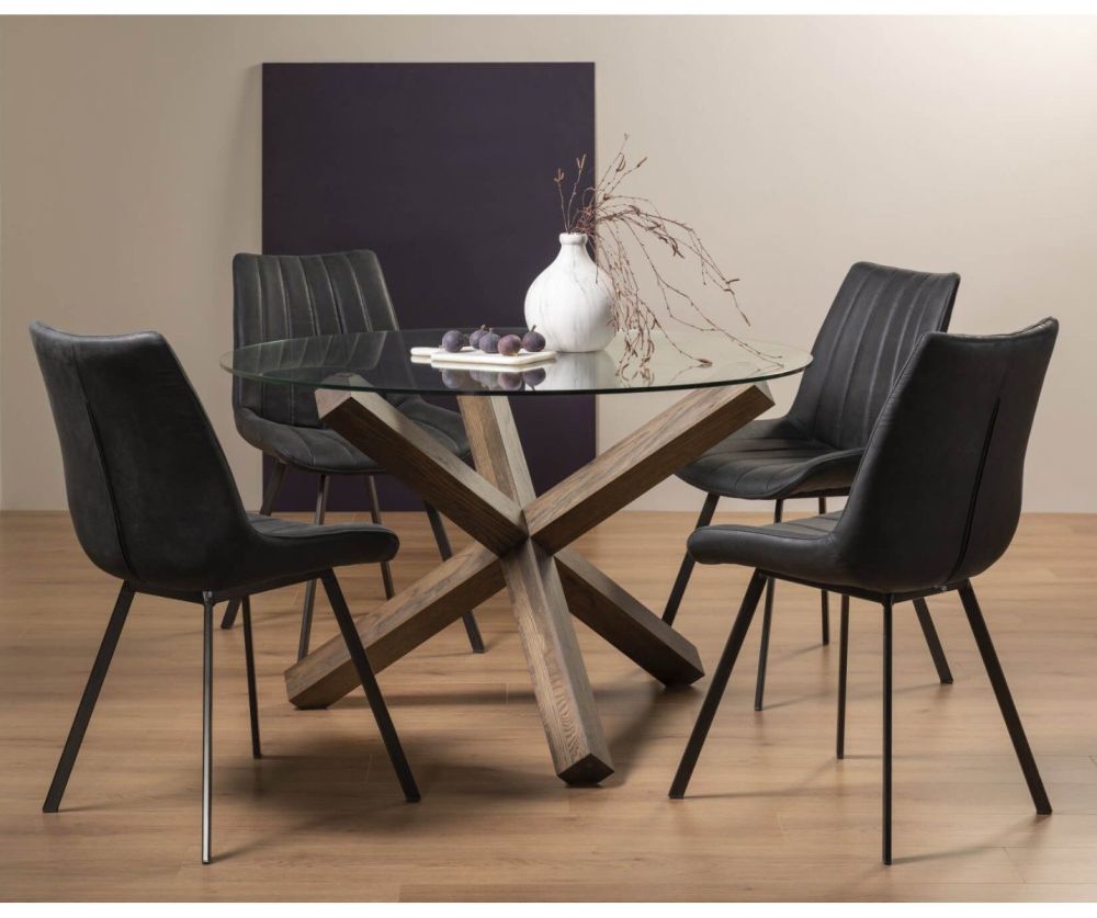 Bentley Designs Turin Dark Oak Circular Glass Dining Table and 4 Fontana Dark Grey Faux Suede Fabric Chairs with Black Legs