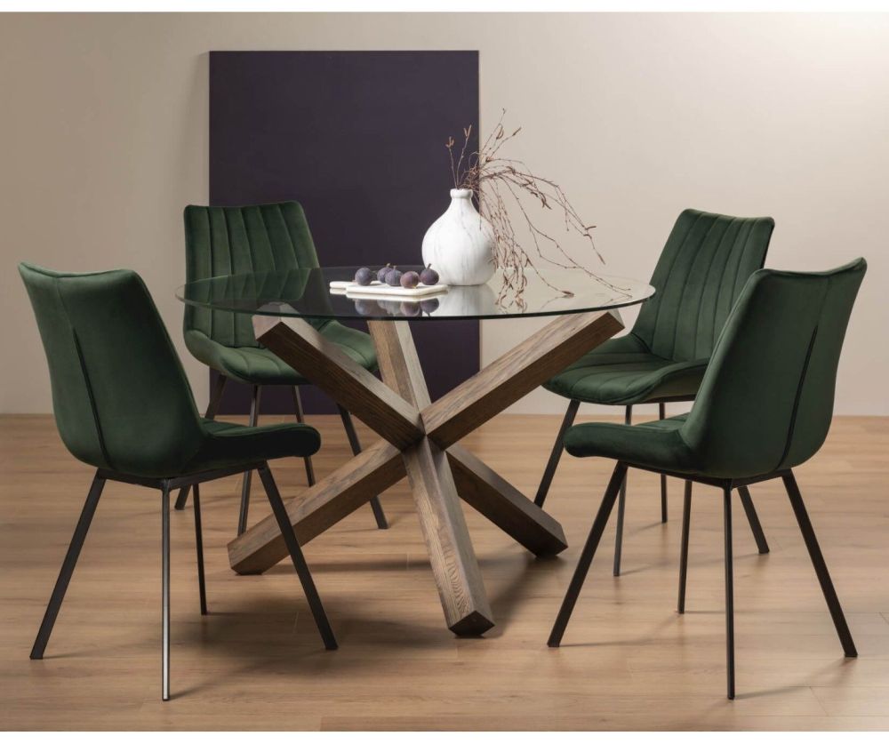 Bentley Designs Turin Dark Oak Circular Glass Dining Table and 4 Fontana Green Velvet Fabric Chairs with Black Legs